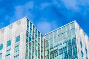 beautiful-architecture-office-business-building-with-glass-window-shape-scaled.jpg